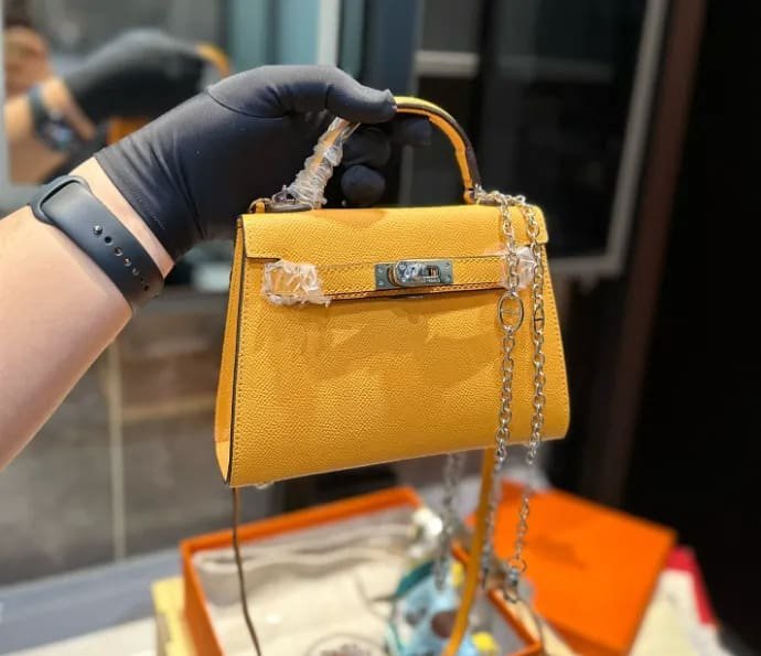 1699440543920.jpg Hermès Amber EPSOM Calfskin Mini Kelly 20cm - Image 1